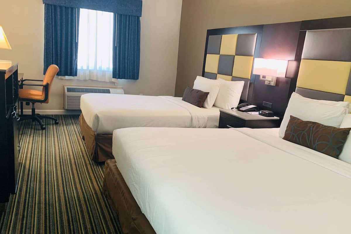 Standard Room, Multiple Beds, Non Smoking, Refrigerator & Microwave | Desk, laptop workspace, iron/ironing board, free cots/infant beds