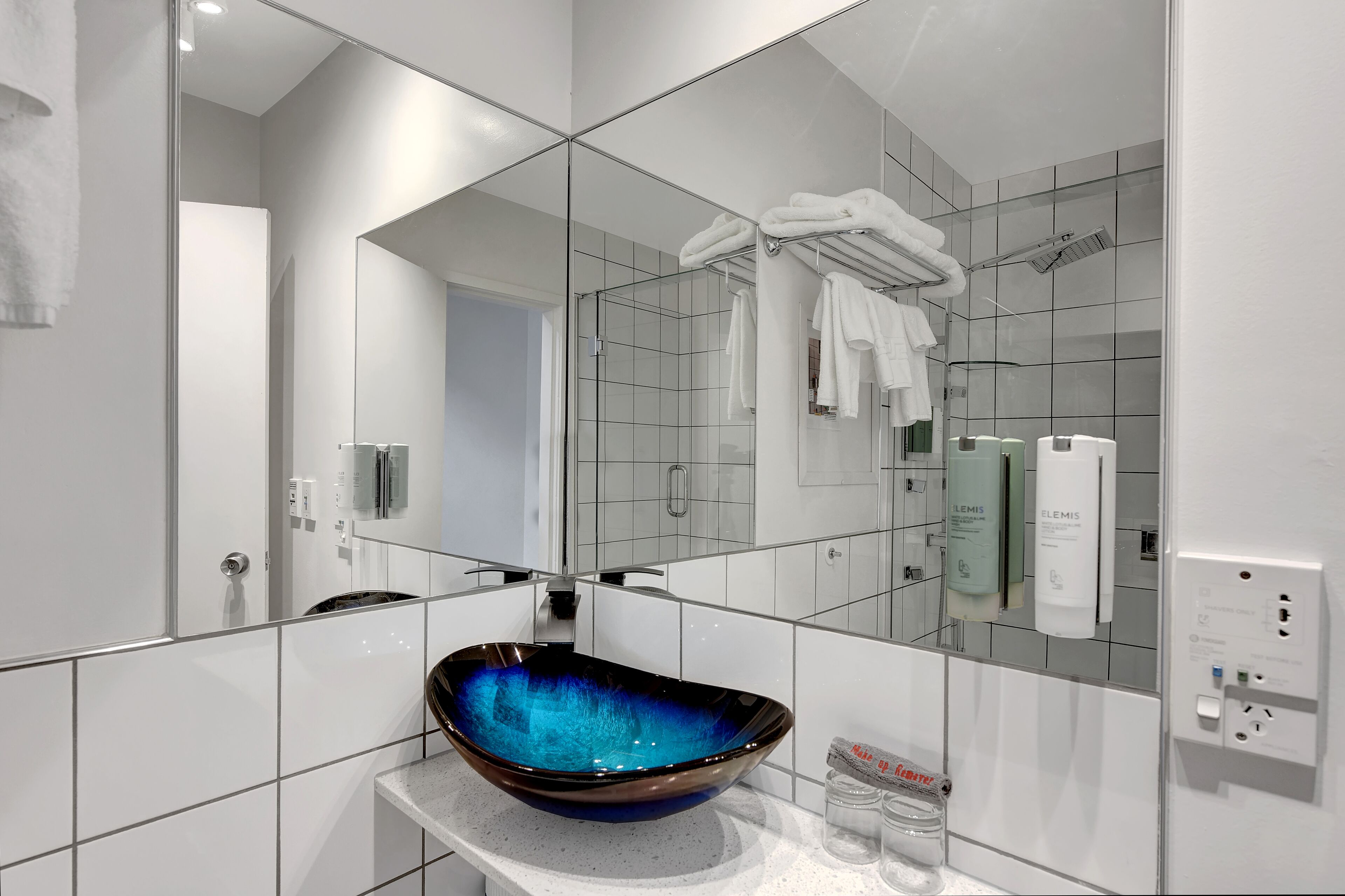 executive studio spa shower | bathroom | eco-friendly toiletries, hair dryer, bathrobes, towels