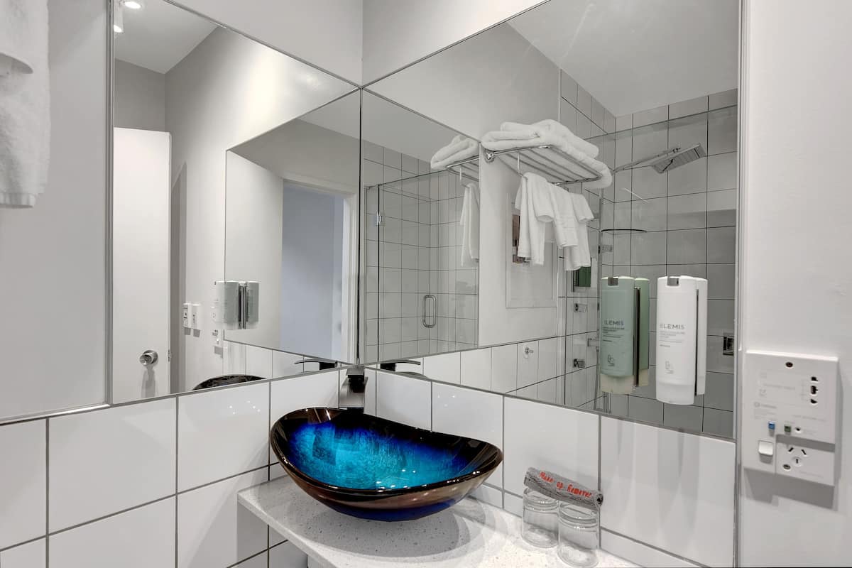executive studio spa shower | bathroom | eco-friendly toiletries, hair dryer, bathrobes, towels