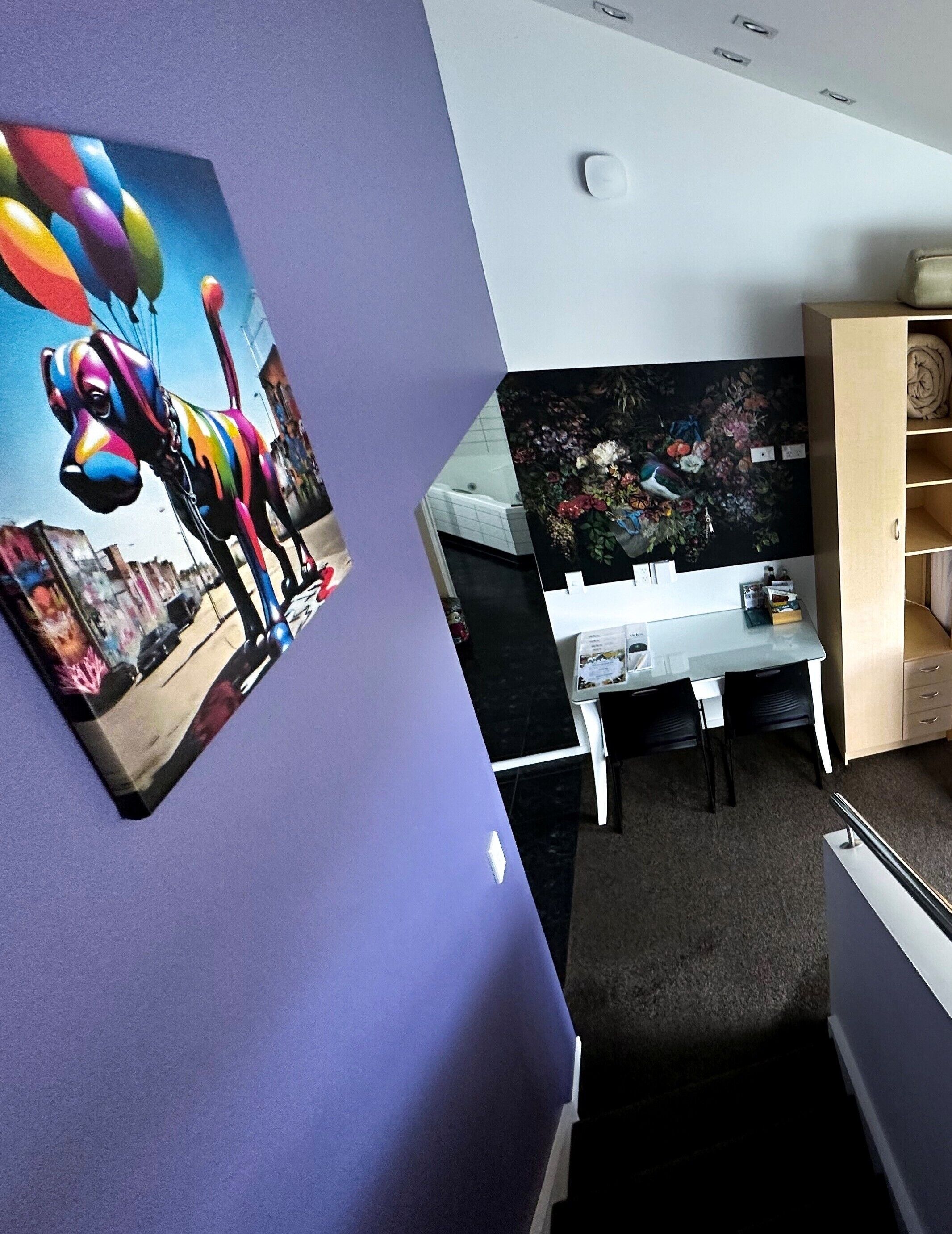 riverfront first floor mezzanine suite | premium bedding, pillow-top beds, minibar, desk