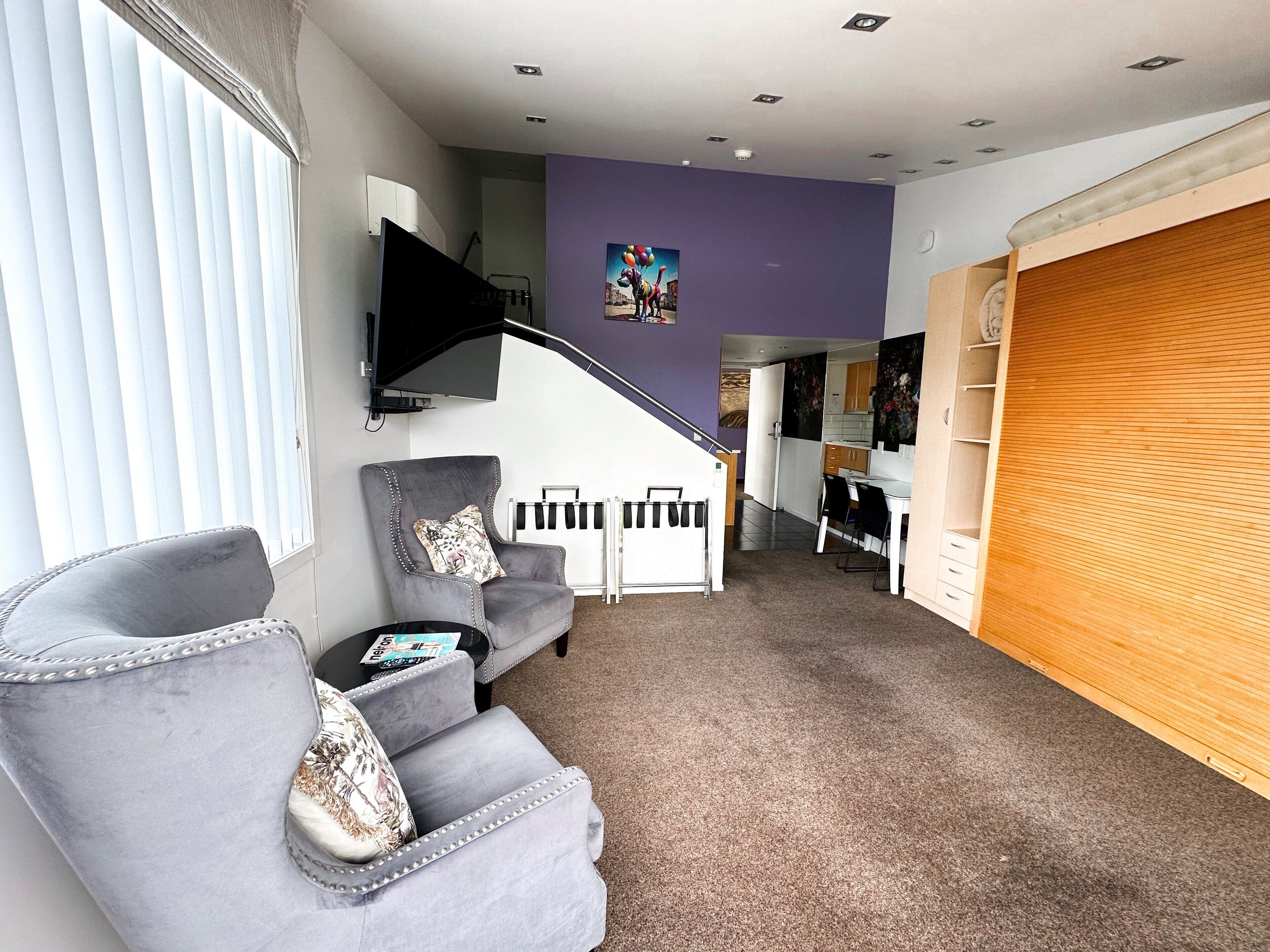 riverfront first floor mezzanine suite | premium bedding, pillow-top beds, minibar, desk