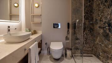 Suite, 1 Bedroom | Bathroom | Free toiletries, hair dryer, bathrobes, slippers