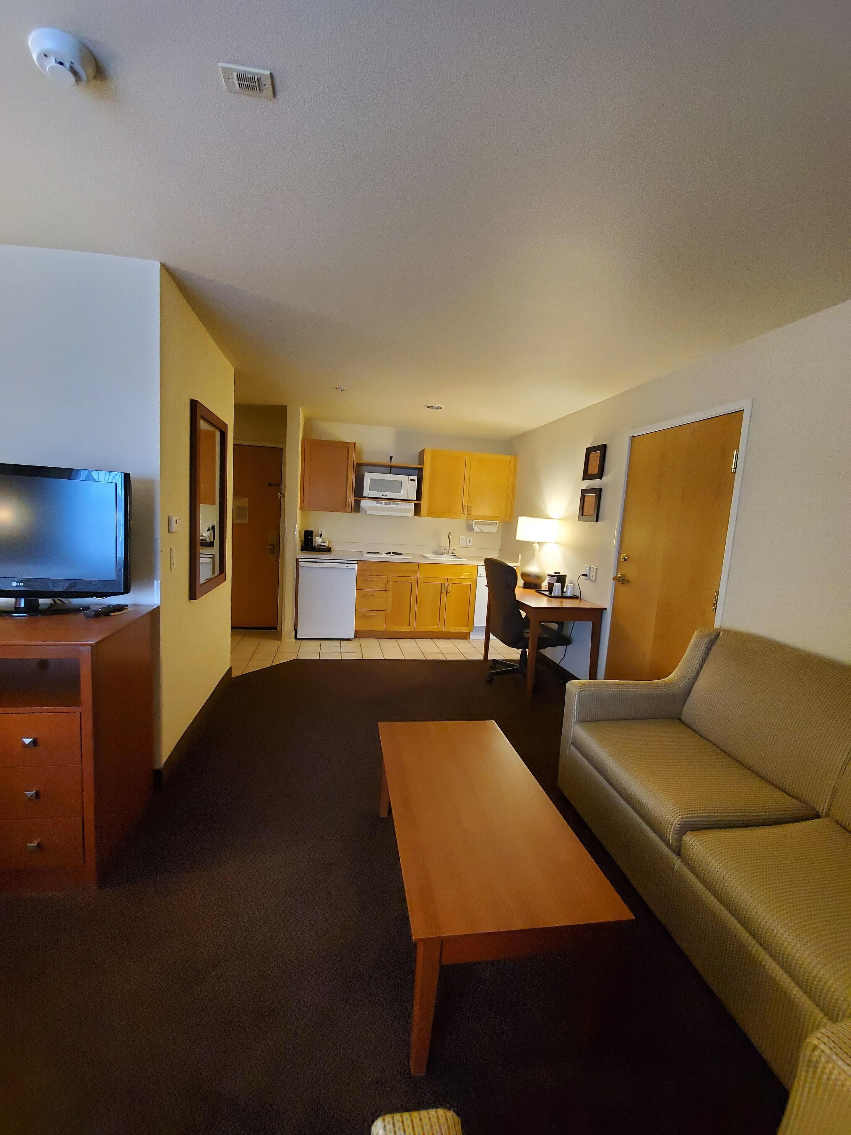 suite, 1 bedroom, non smoking | desk, blackout curtains, iron/ironing board, free cots/infant beds