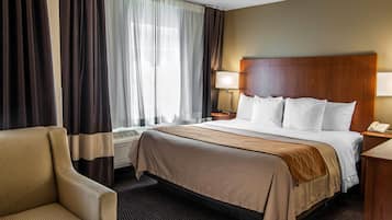 Suite, 1 cama de matrimonio grande, no fumadores | Escritorio, cortinas opacas, tabla de planchar con plancha