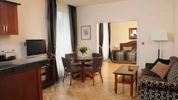 Apartment, 1 King Bed with Sofa bed | Living room | 81-cm LCD TV with satellite channels, TV