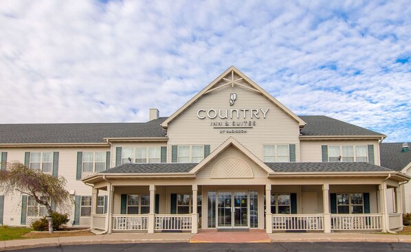 Country Inn & Suites offers a simple, two-story design with a central entrance and pitched roof.