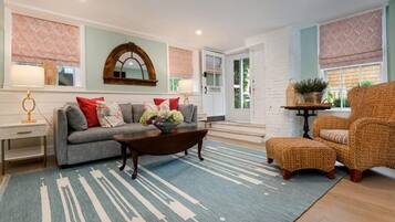 Sherburne Queen Suite with Sleeper Sofa | Living area | Flat-screen TV