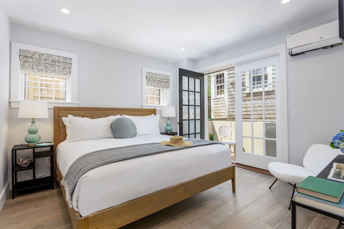 Regatta King with Private Patio | 1 bedroom, Frette Italian sheets, premium bedding, iron/ironing board
