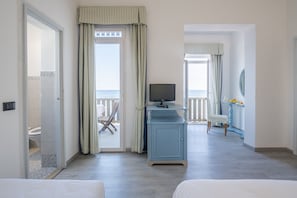 Double Room, Balcony, Sea View | Minibar, desk, laptop workspace, bed sheets