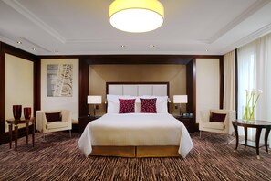 Premium bedding, down comforters, pillowtop beds, minibar