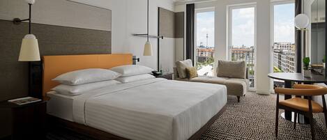 Premium bedding, down comforters, pillowtop beds, in-room safe