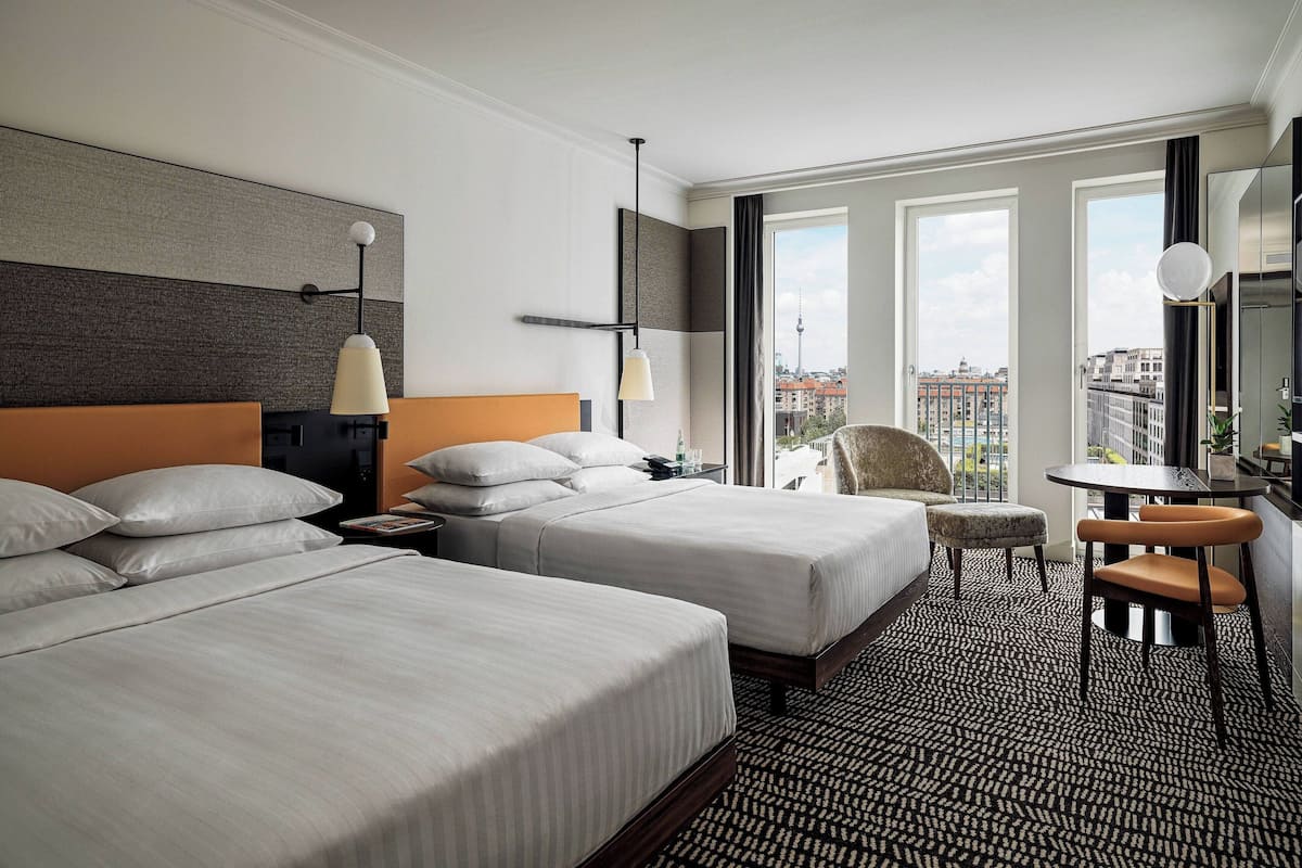 Premium bedding, down comforters, pillowtop beds, in-room safe