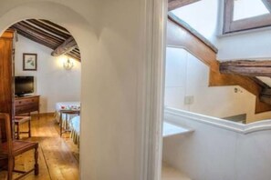 Triple Room | Minibar, in-room safe, individually decorated, free WiFi