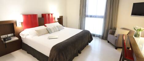 Down comforters, minibar, in-room safe, desk