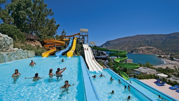 A water park with multiple slides and a pool area. - Fodele Beach & Water Park Holiday Resort - All Inclusive (Malevizi)