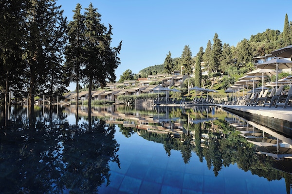 2 outdoor pools, pool umbrellas, sun loungers