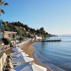On the beach, sun-loungers, beach umbrellas, beach towels