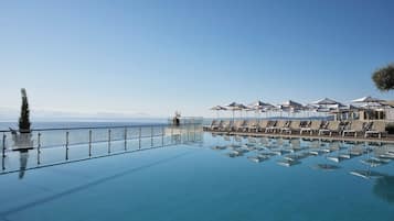 2 outdoor pools, pool umbrellas, pool loungers