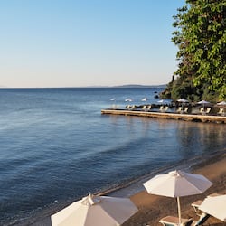 On the beach, sun-loungers, beach umbrellas, beach towels