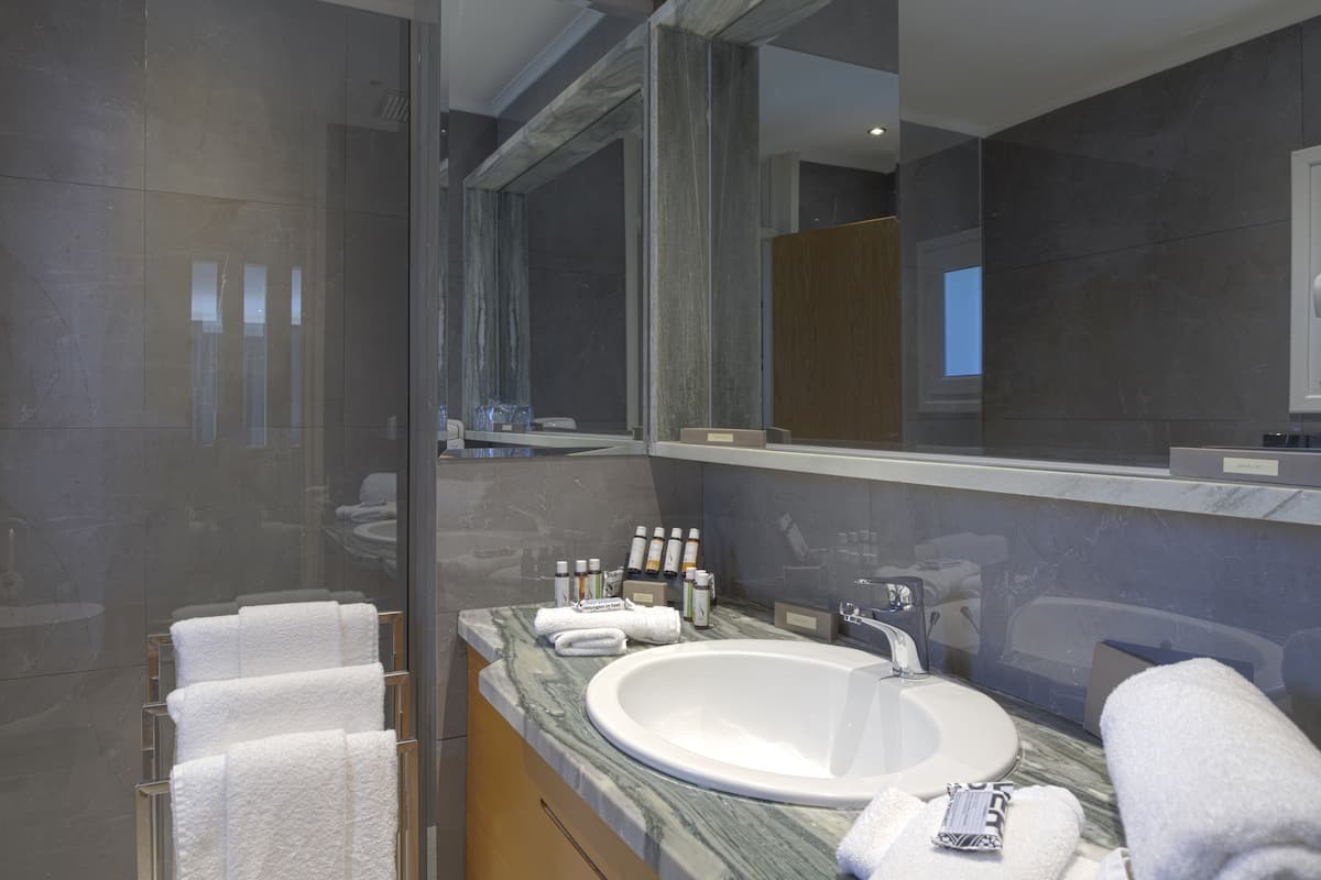 kalotheatis - 2 bedroom bungalow sea view/ mouse island view | bathroom | designer toiletries, hair dryer, slippers, towels