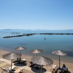On the beach, sun loungers, beach umbrellas, beach towels