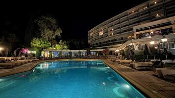 Indoor pool, seasonal outdoor pool, pool umbrellas, pool loungers