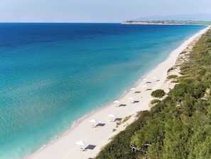 Private beach, beach umbrellas, beach towels, beach massages