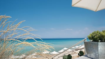 Private beach, beach umbrellas, beach towels, beach massages