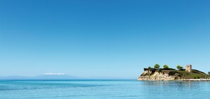 Private beach, beach umbrellas, beach towels, beach massages