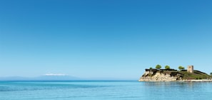 Private beach, beach umbrellas, beach towels, beach massages