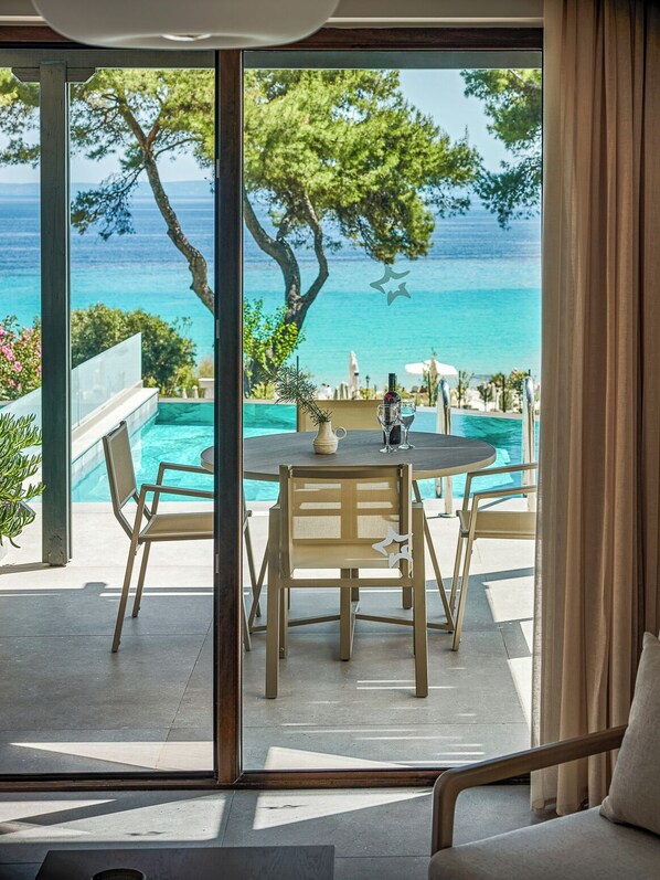 Signature suite, privézwembad | Uitzicht vanuit de kamer