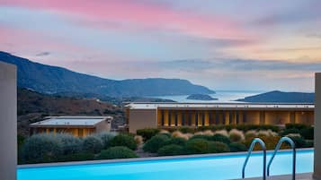 Indoor pool, 3 outdoor pools, open 10:00 AM to 6:00 PM, pool umbrellas