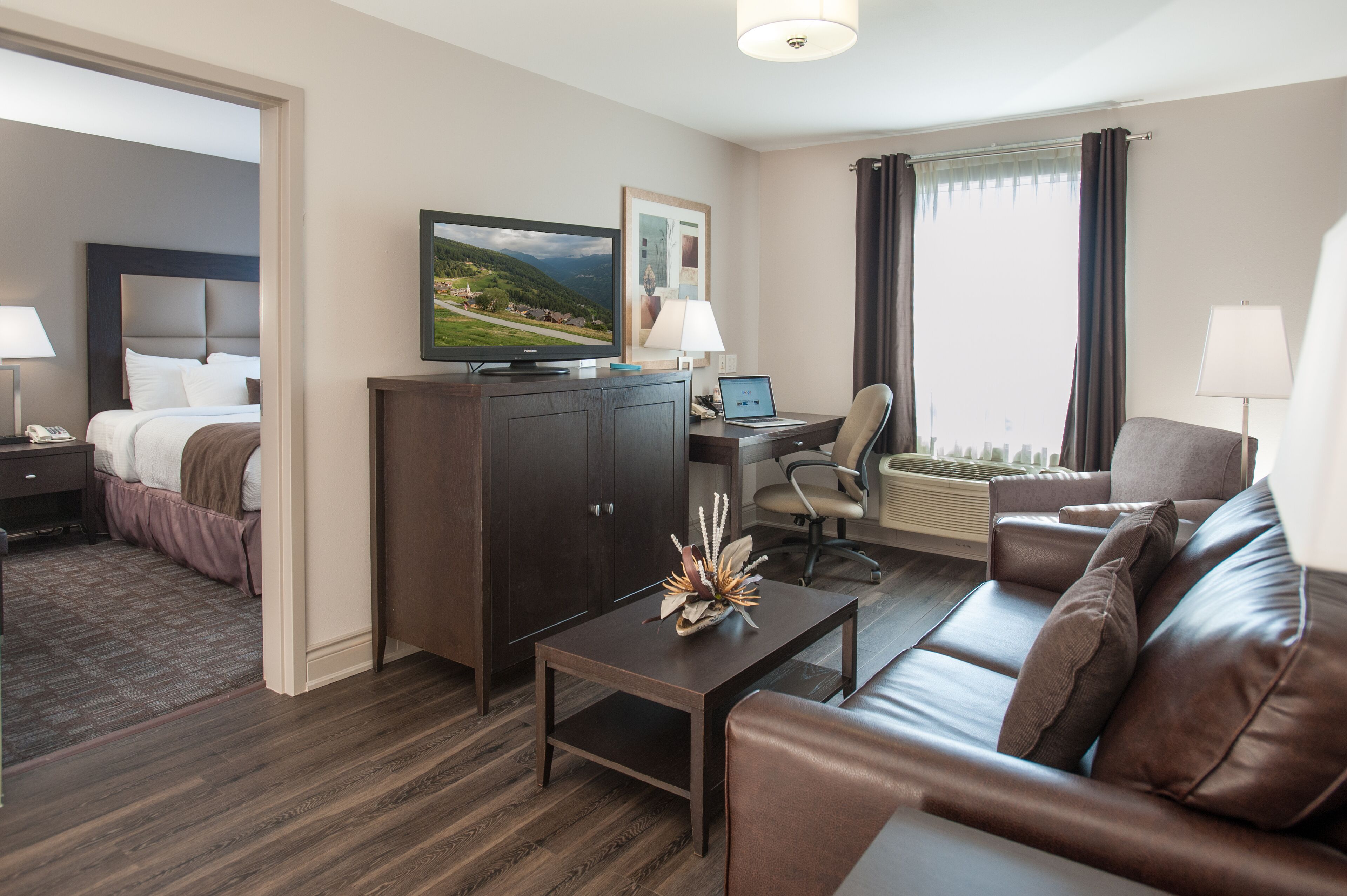 suite, 1 king bed, non smoking, refrigerator & microwave | in-room safe, desk, iron/ironing board, free wifi