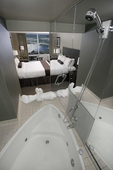 Tower Room Falls View One King Heart-shaped Jacuzzi room | Bathroom | Designer toiletries, hair dryer, towels, soap at Oakes Hotel Overlooking the Falls