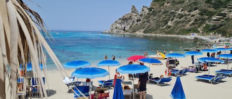 Perto da praia, serviço de traslado de/para a praia grátis 