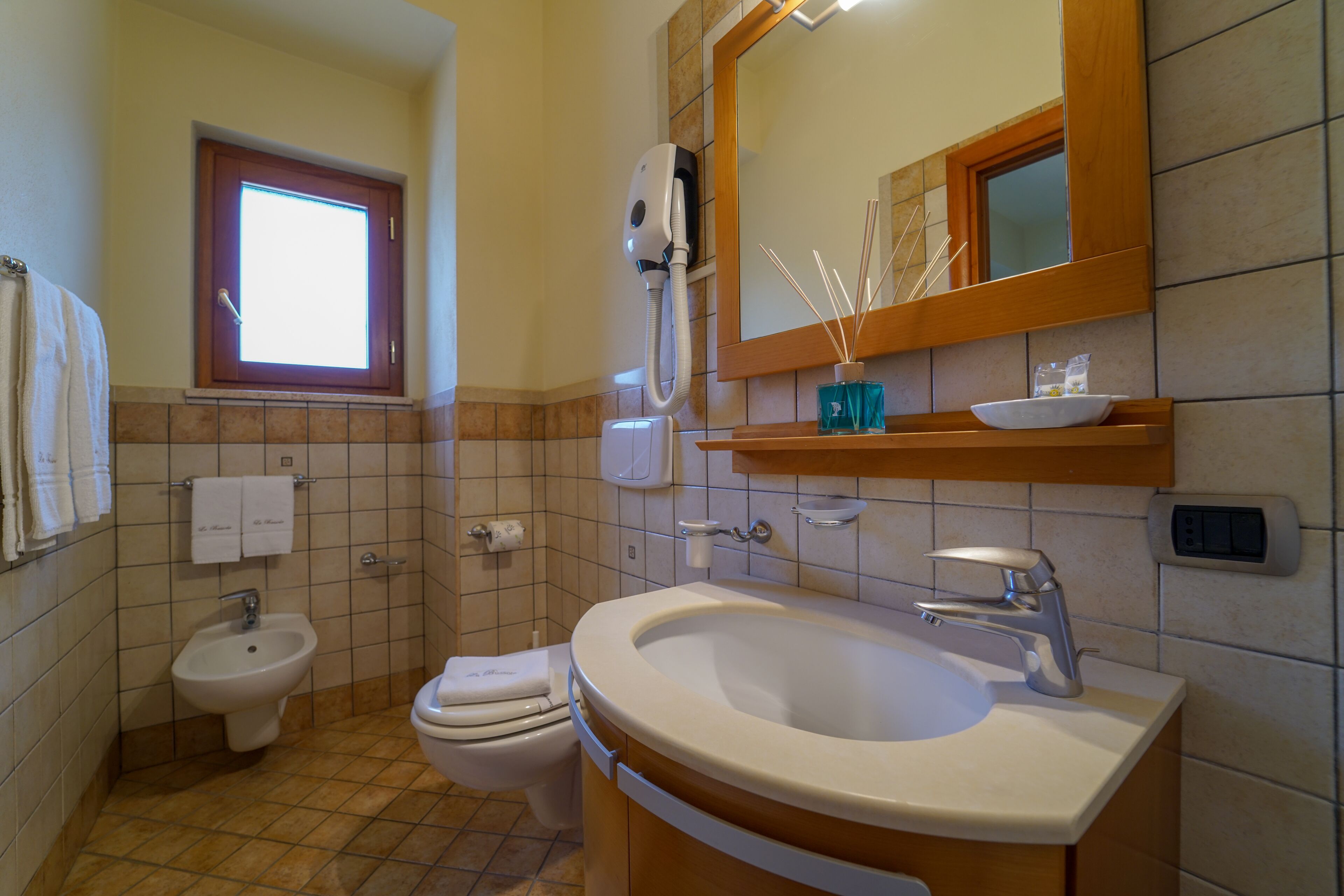 shower, rainfall showerhead, designer toiletries, hair dryer