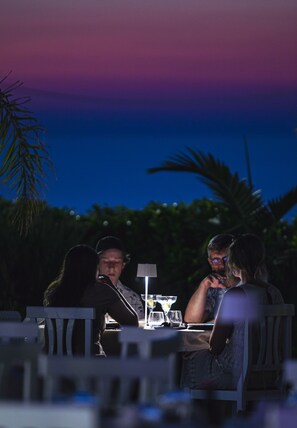 Lunch, dinner, brunch served; Italian cuisine, garden views 