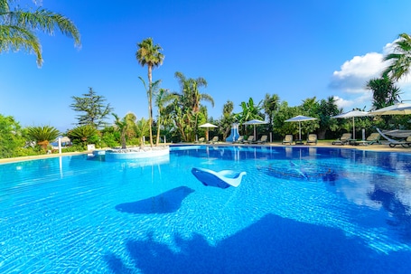 2 outdoor pools, pool umbrellas, pool loungers. La Bussola Hotel Restaurant