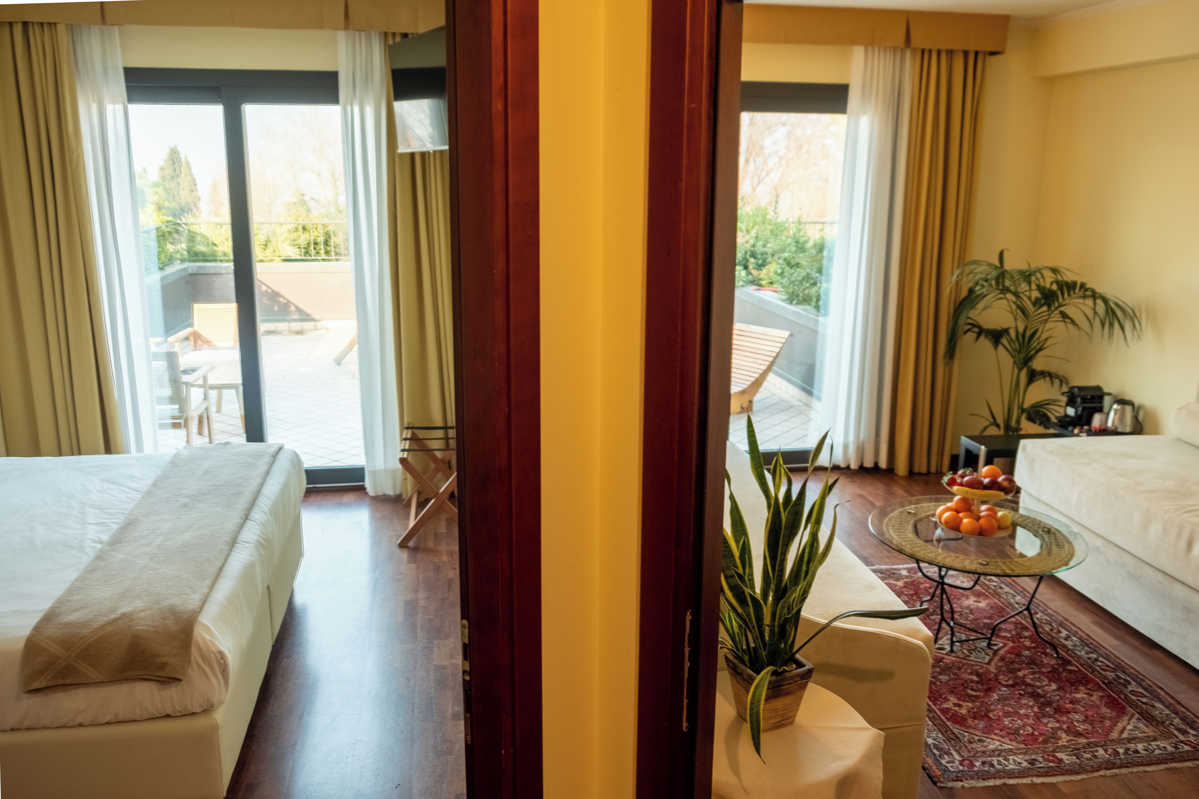 superior suite, 2 bedrooms, lake view | 1 bedroom, down duvets, in-room safe, desk