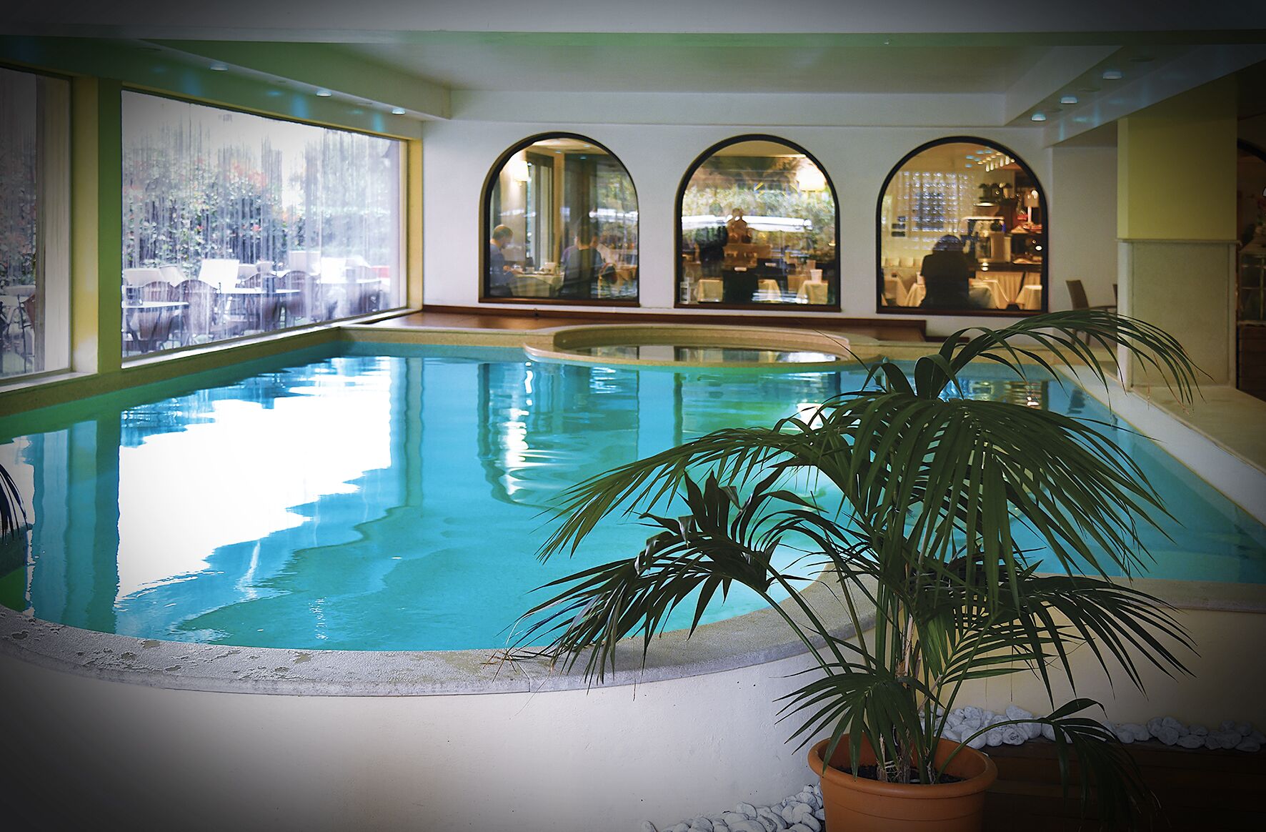 indoor pool, pool umbrellas