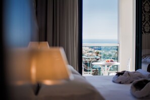 Down comforters, minibar, in-room safe, blackout drapes