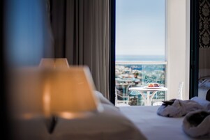 Down comforters, minibar, in-room safe, blackout drapes