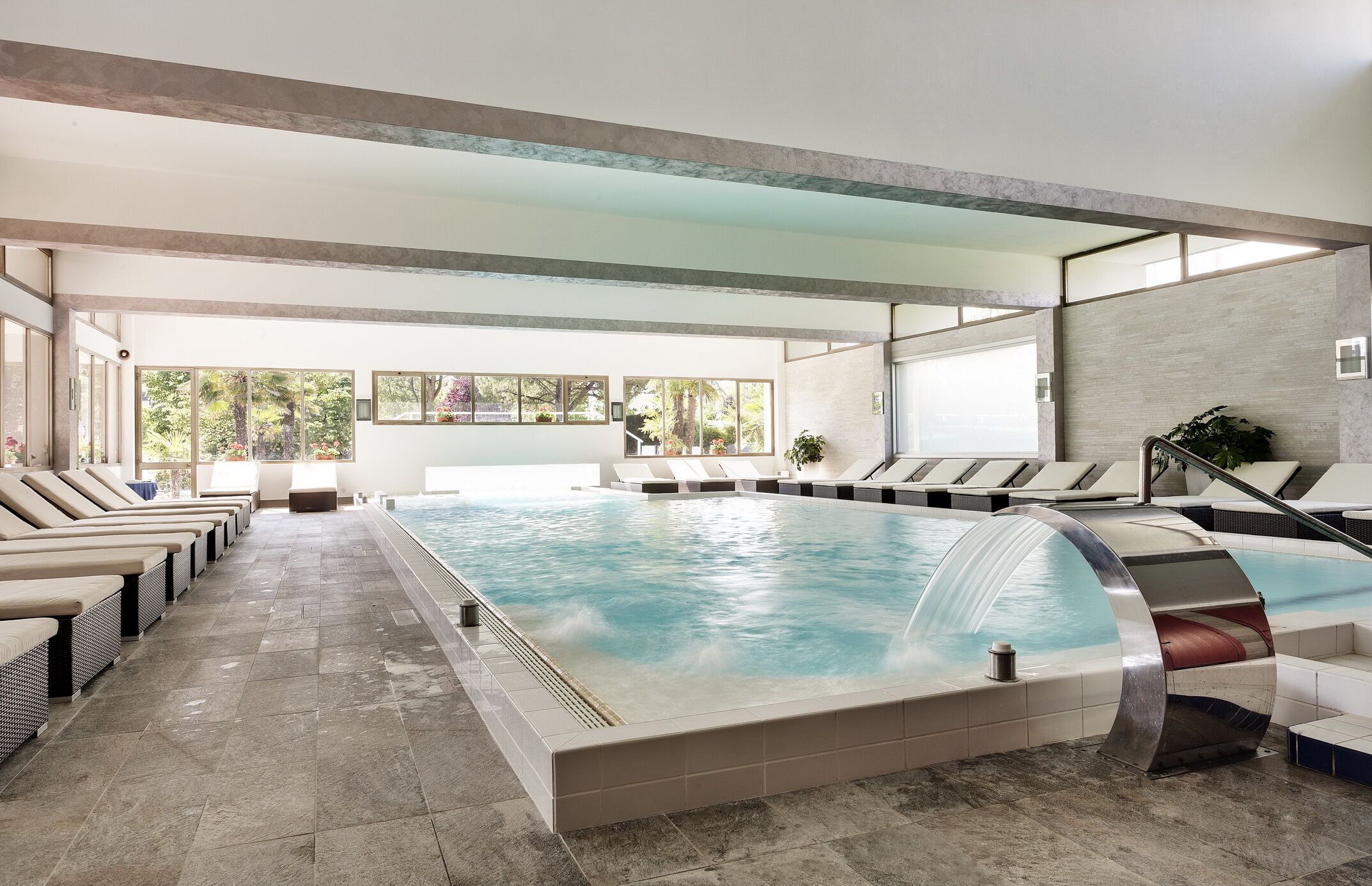 Indoor pool, outdoor pool, pool umbrellas, sun loungers