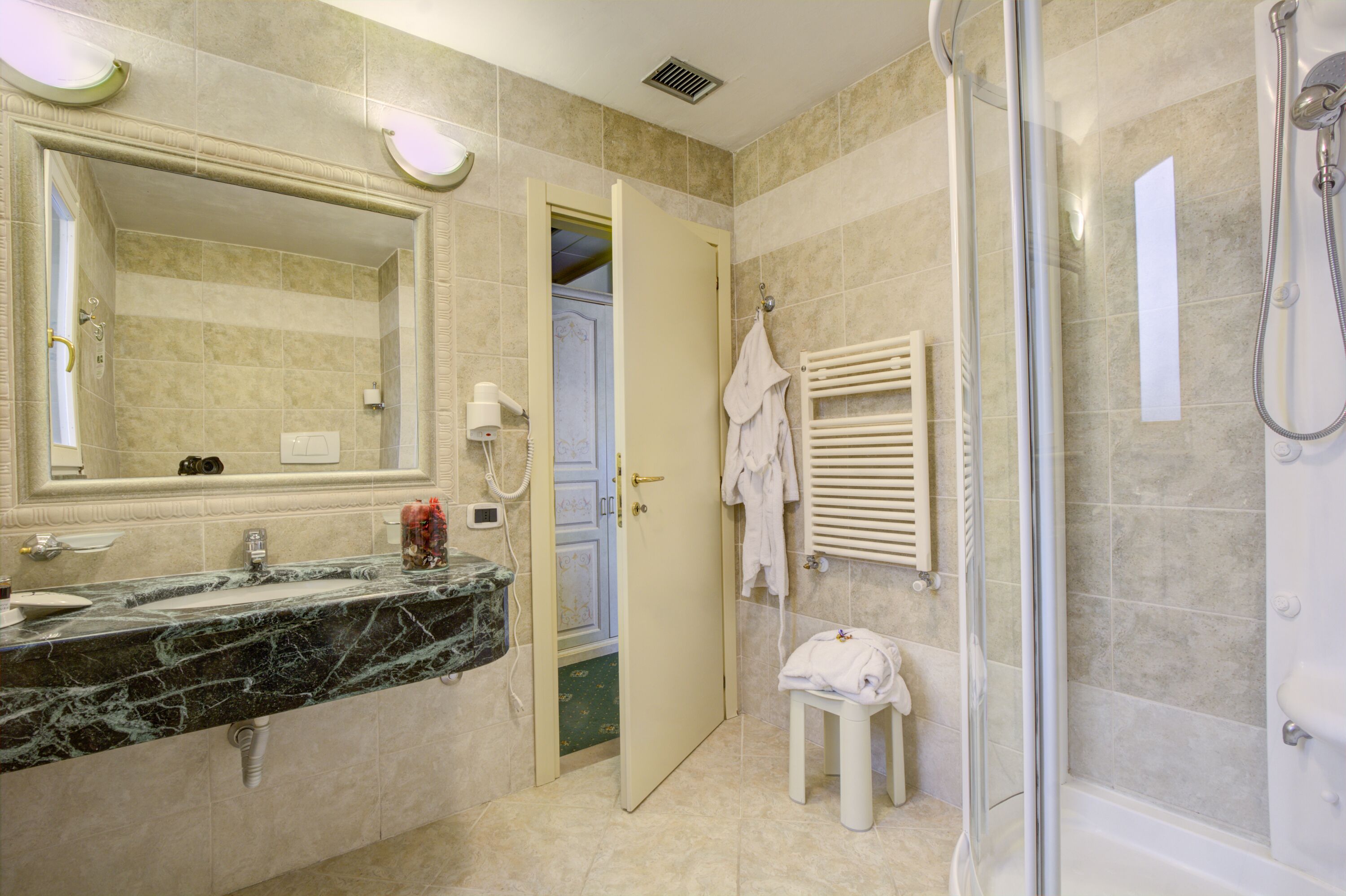 superior double room (jetted shower) | bathroom | free toiletries, hair dryer, slippers, bidet