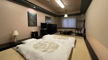 Premium bedding, desk, laptop workspace, iron/ironing board