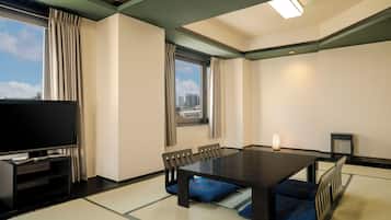 Premium bedding, desk, laptop workspace, iron/ironing board
