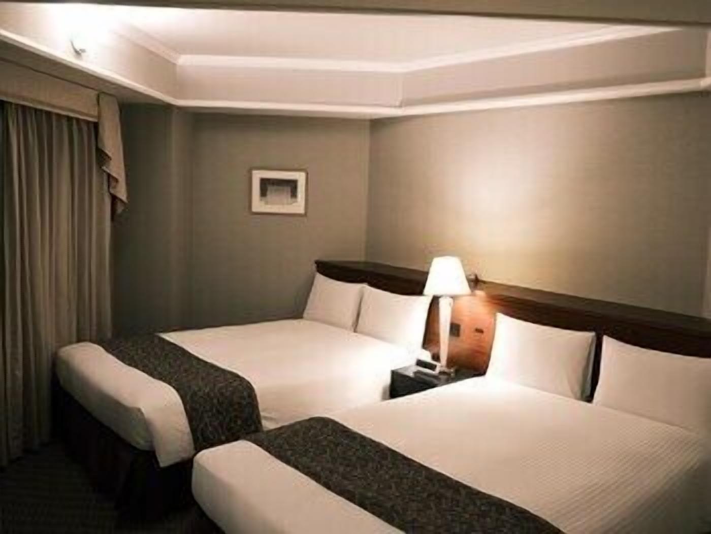 Premium bedding, desk, laptop workspace, iron/ironing board