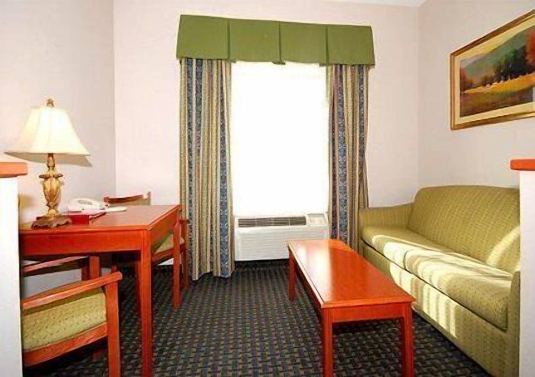 suite, 1 king bed with sofa bed, accessible, non smoking | living area | 37-inch lcd tv with cable channels, tv, pay films