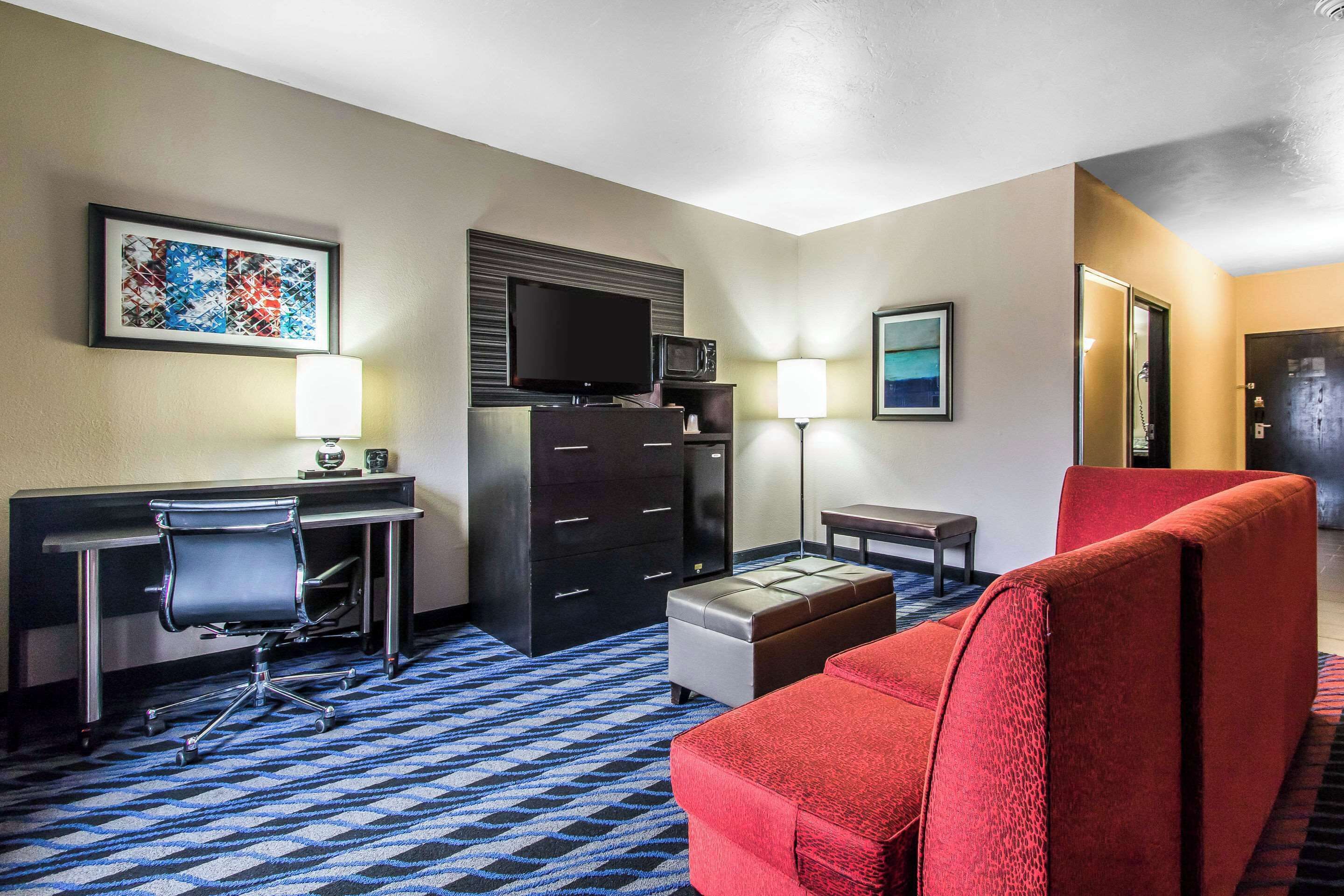 suite, 1 king bed with sofa bed, accessible, non smoking | desk, iron/ironing board, free cots/infant beds, free rollaway beds