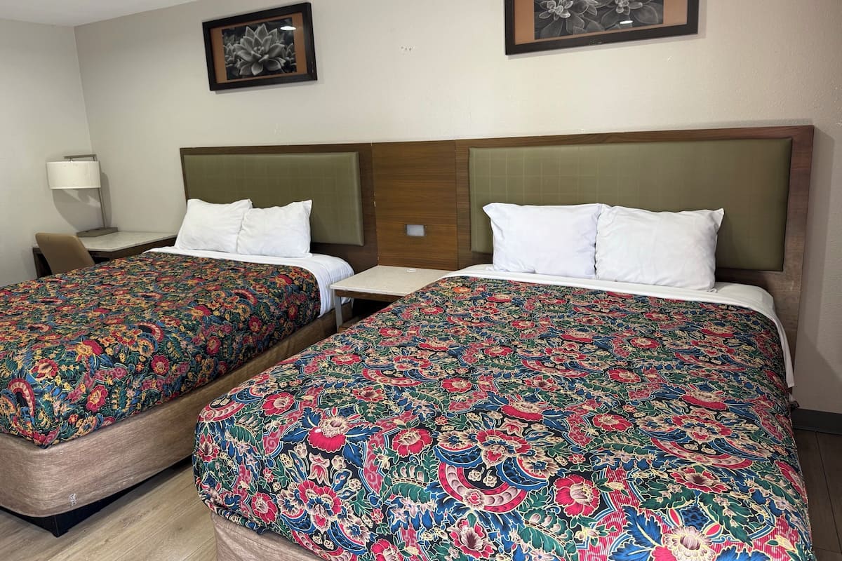 Room, 2 Queen Beds, Non Smoking | Iron/ironing board, free WiFi, bed sheets